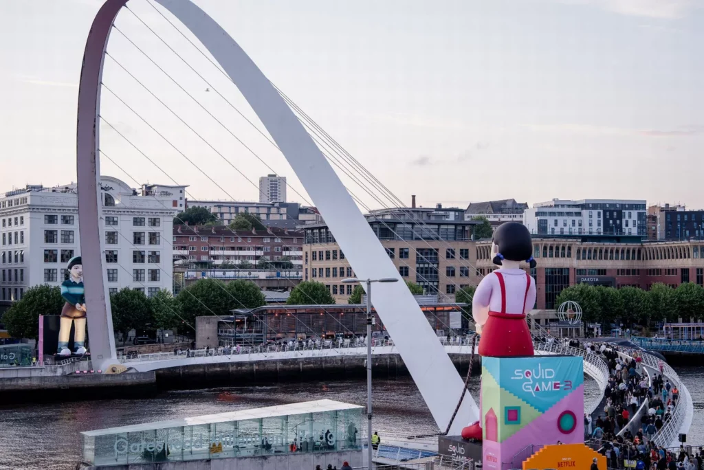 Squid Game Inflatables Staring at Each Other In Newcastle